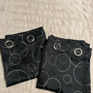 Target 2 panel grommet curtains, black with neutral circle pattern, each 84 x 54